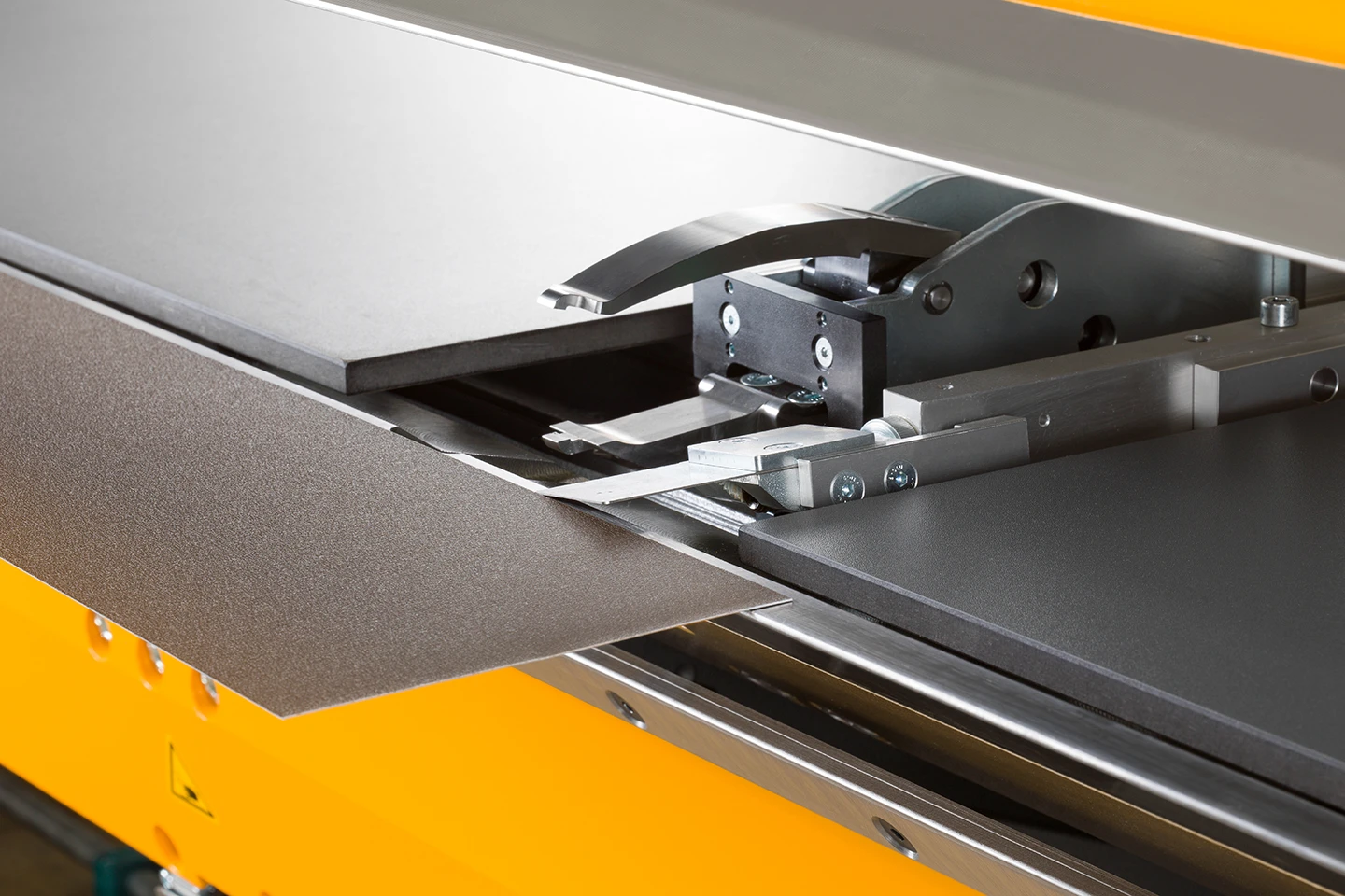 backgauge finger of spring steel positioning the metal sheet in a thalmann tc double folder